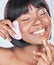 Gua Sha, beauty and black woman smile with cosmetics, skincare and dermatology in studio. Wellness, youth serum and rose