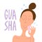 Gua sha facial massage by rose quartz stone. Woman making guasha acupuncture treatment.
