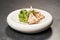 Guacamole with pita chips on white plate. Chef`s signature dish