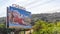 Guadalajara, Jalisco / Mexico. Month 20th. 2020. Huge commercial sign with a woman with tulips in the background