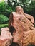 Guanyu red granite statue