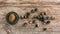 Guarana nuts and powder on wooden background, top view