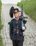 Guard at his post, dressed in a ceremonial uniform, with weapons, very serious and focused on his duty