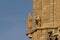 Guard and lion sculpture, detail of the Belfry of Ghent