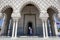 A guard stands at the entrance to the Mausoleum of Mohammed V located in Rabat, Morocco.