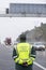 Guardia Civil officer next to a speed control monitors traffic