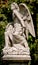 Guardian Angel statue in a cemetery outdoor