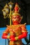 Guardian of the Buddha nio or dvarapala standing at the entrance of Buddhist temple in Thailand wat