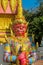 Guardian of the Buddha nio or dvarapala standing at the entrance of Buddhist temple in Thailand wat