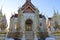 Guardian giant is standing in front of church Buddhist temple closeup.