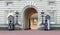 Guards in greatcoats on sentry duty at Buckingham Palace in London on February 21,