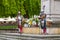 Guards in knightly clothing next to a column, Sandomierz, Poland.