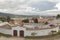 Guatavita town landscape with bullring at front and andean moutnains at background