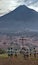 Guatemala, august 2019: View from Cerro de la Cruz on Antigua. Soccer players training cardio in front of cross.