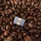 A Guatemala flag placed over roasted coffee beans