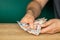 Guatemala money, a man in a shirt holds banknotes in his hands, counting money, financial settlements, Creative business concept