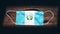 Guatemala National Flag at medical, surgical, protection mask on black wooden background. Coronavirus Covidâ€“19, Prevent