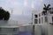 Guayaquil, Ecuador. View of the Planchado park from above, with a fountain, statue and the city in the background