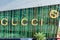 Gucci sign advertises Italian luxury brand store at The Shops at Crystals shopping center sign