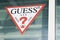 Guess usa washed jeans logo and sign text on storefront shop luxury clothing American