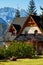 Guesthouse and mountain snowy landscape horizon