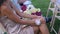 Guests With A flower Bouquets Sitting on a Wedding Ceremony