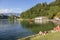 Guests and residents of Bled relax on the lake