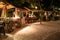 Guests selecting food during the international cuisine dinner outdoors setup at the tropical island restaurant