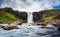 Gufufoss waterfall flowing thourgh rocks in summer at Seydisfjordur, East of Iceland