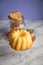 Gugelhupf ring cake, muffins, Italian puff pastry fan wavers cookies biscuits as selection buffet on marble table and lilac