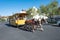 guide explains tourists the history of Solvang in a horse drawn cart and covers all important landmarks of the danish village