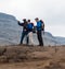 Guide instructs hiking tourists on mountain (2)