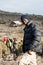 Guide leading hiking tourists into mountain