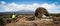 Guides porters and sherpas carry heavy sacks as they ascend mount kilimanjaro the tallest peak in africa.