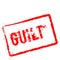 Guilt red rubber stamp isolated on white.