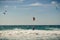 Guincho beach sea with surfers doing kitesurf