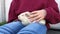 Guinea pig sits on child\'s laps.