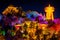 Guishan Dafo Big Buddha temple with the giant Tibetan Buddhist prayer wheel colourfully illuminated at night long exposure shot