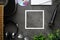 Guitar and accessories on a stone background. Desk musician, headphones, microphone