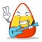 With guitar candy corn character cartoon