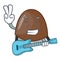 With guitar chocolate candies mascot cartoon