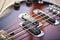 Guitar Lessons. Close-up view of electric guitar body with metal strings, volume and tone controls