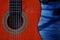guitar orange color backgrounds wood shadow outdoors musical instrument blue color textured