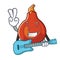 With guitar red kuri squash mascot cartoon