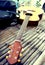 Guitar resting on bamboo desk.