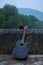 Guitar and roses on Roman Bridge in Sarajevo