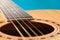 Guitar sound hole and strings closeup