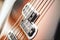 Guitar Structure. Close-up view of electric guitar body with metal strings and pickups.