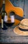 Guitar and Wine on a wood table