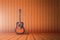 Guitar in wood room.